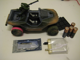 Photo of Warthog and assorted batteries.