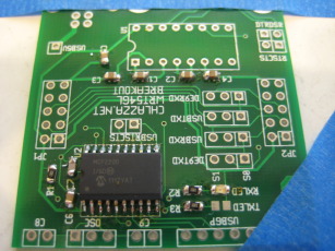 Photo of the adapter with most of the surface mount parts installed.